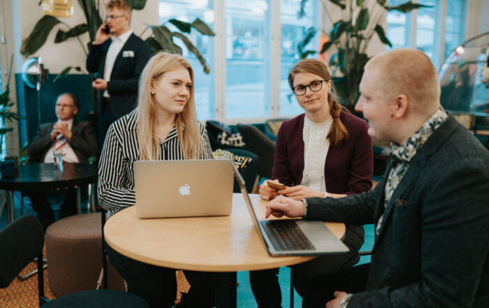 FinProma team collaborating on strategic solutions