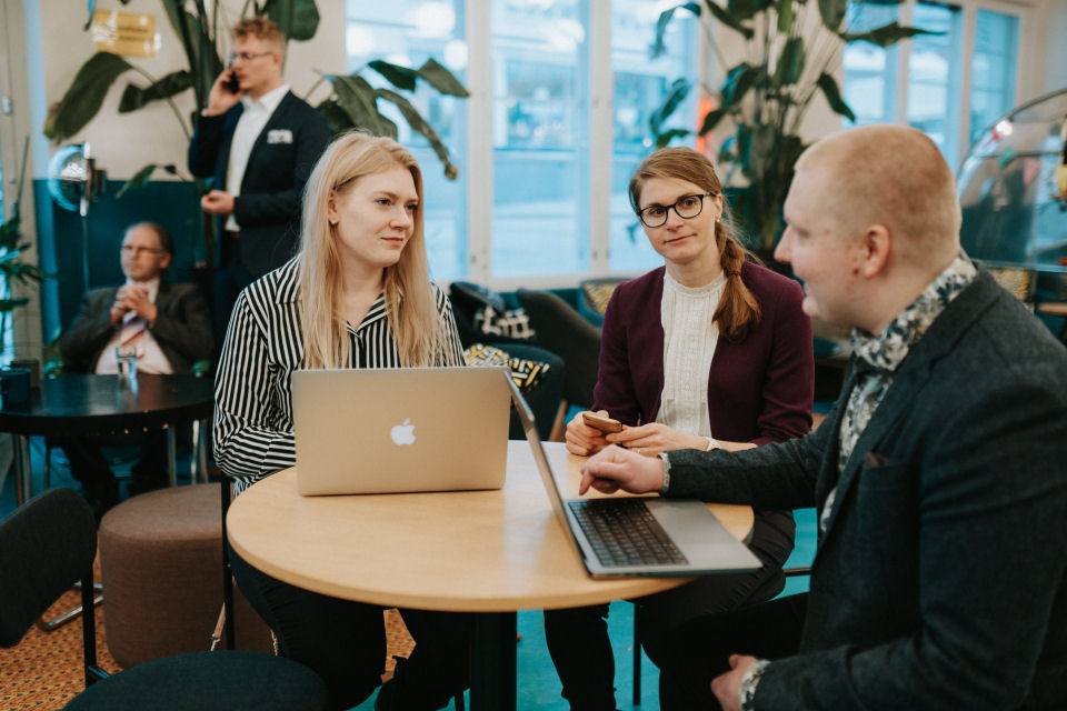 FinProma team collaborating on strategic solutions